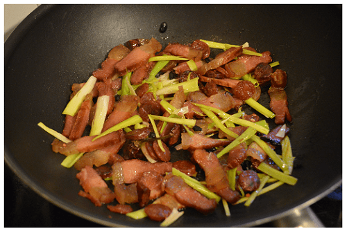 Fry Chinese Hunan Preserved Pork with ingredients.