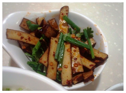 Chinse seasoned tofu with chilli and spring onions.