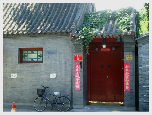 A Bike and Old  Style House at Beijing Huguosi Street.