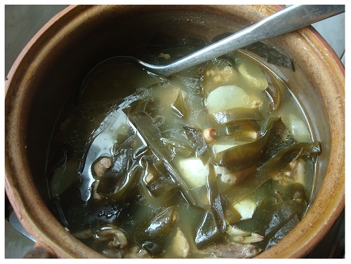 Chinese Chicken Kelp Herb Soup Cooked in Chinese Clay Pot.