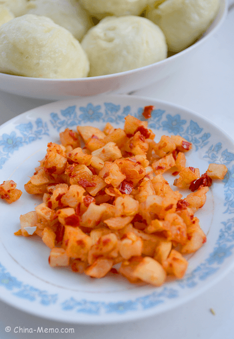 Chinese pickled white radish with red chilli.