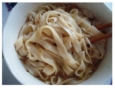 Chinese Food: Hunan Flat Rice Noodle Soup.