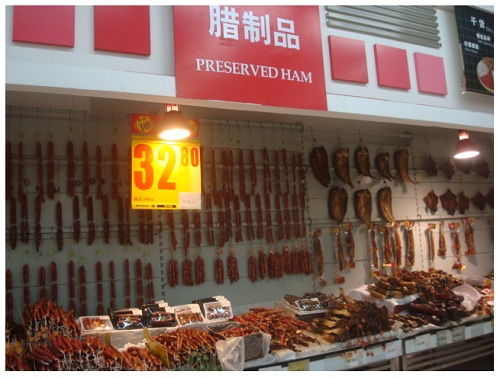 China Hunan preserved meat in local food market.